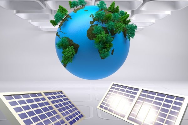 Digitally generated image of solar panel and trees growing over globe